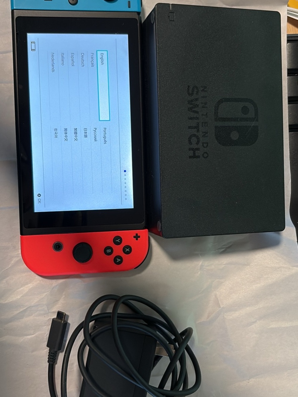 Nintendo Switch with Neon Red and Neon Blue Joy‑Con Pair